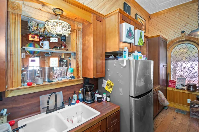 a view of a chairs and tables in a patio