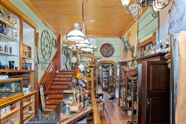 a bathroom with a sink a bathtub and a window
