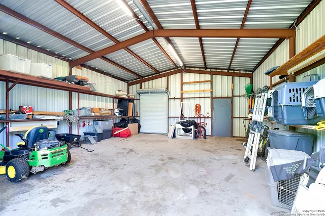 a view of an empty room and a window
