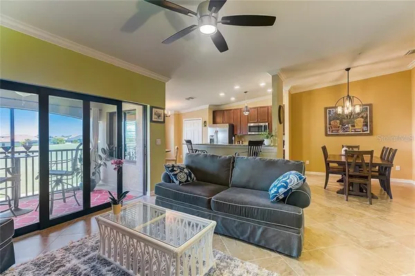 a dining room with a table and chairs