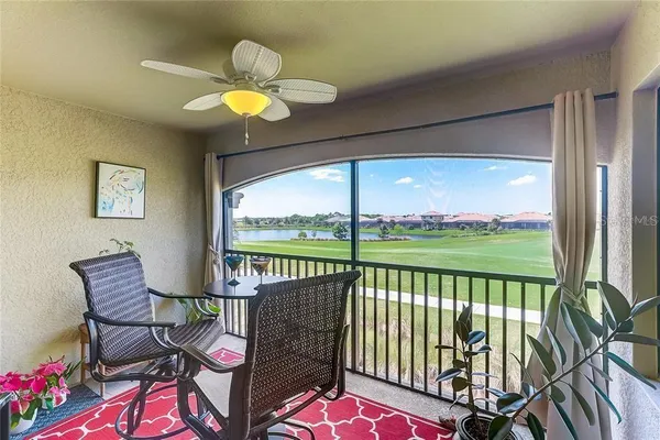 a kitchen with stainless steel appliances granite countertop a sink refrigerator and cabinets