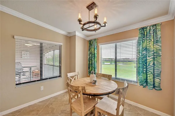 a bedroom with a bed and lamp