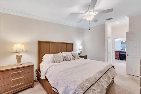 a view of a swimming pool with a house in the background