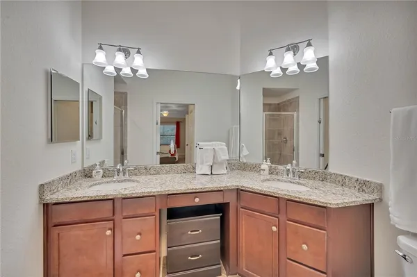 a front view of multiple houses with yard