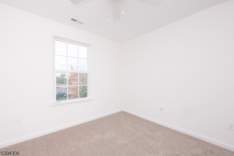 11 Panfili Lane Hamilton, NJ 08610 - Photo 14 of 29 an empty room with a window