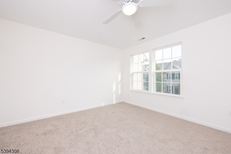 11 Panfili Lane Hamilton, NJ 08610 - Photo 16 of 29 a view of an empty room with a window