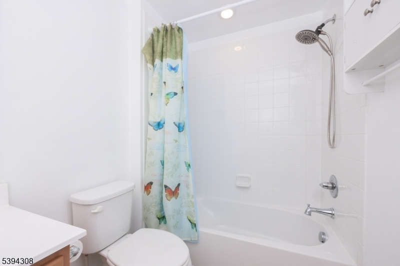 11 Panfili Lane Hamilton, NJ 08610 - Photo 25 of 29 a bathroom with a shower and a toilet