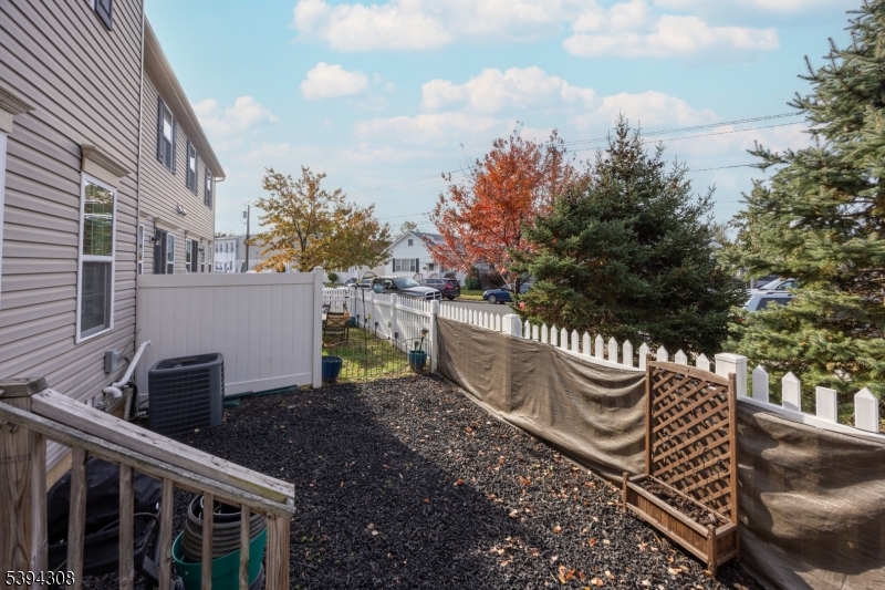 11 Panfili Lane Hamilton, NJ 08610 - Photo 26 of 29 a view of a patio with table and chairs and potted plants