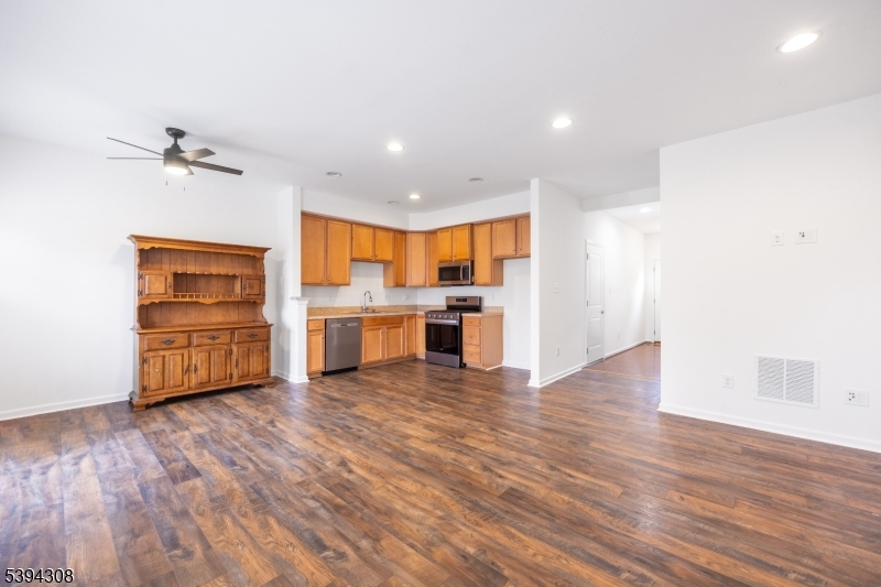 11 Panfili Lane Hamilton, NJ 08610 - Photo 4 of 29 a view of kitchen with wooden floor electronic appliances and window