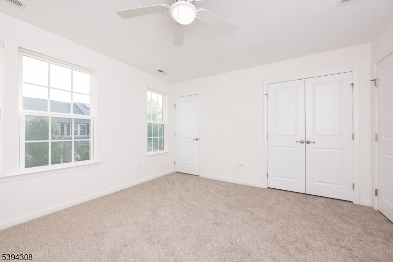 11 Panfili Lane Hamilton, NJ 08610 - Photo 8 of 29 an empty room with windows