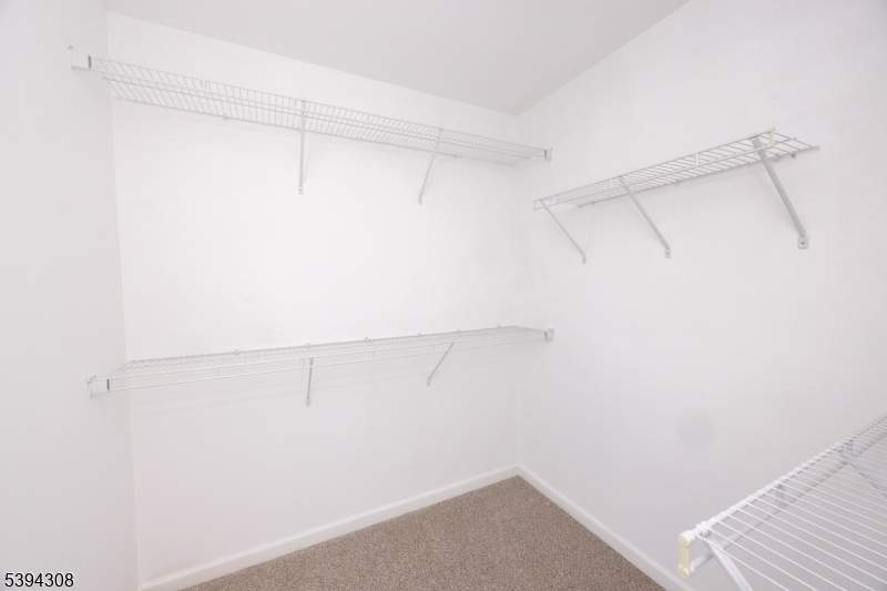 11 Panfili Lane Hamilton, NJ 08610 - Photo 10 of 29 a view of a room with racks on the wall