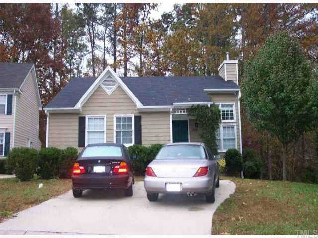 4616 Timberhurst Drive Raleigh, NC 27612 - Photo 1 of 1 a car parked in front of a house
