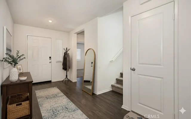 a view of entryway with wooden floor