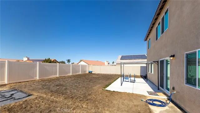 a view of a house with entertaining space