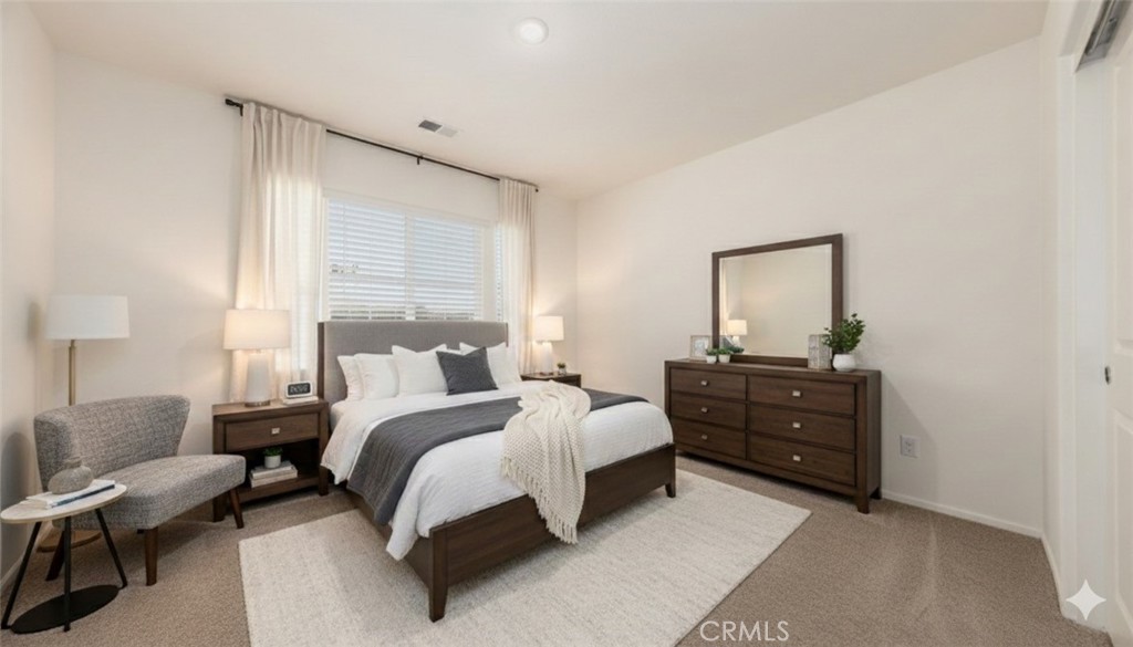 1455 Honor Way Hemet, CA 92543 - Photo 4 of 15 a bed room with a bed window and a chair