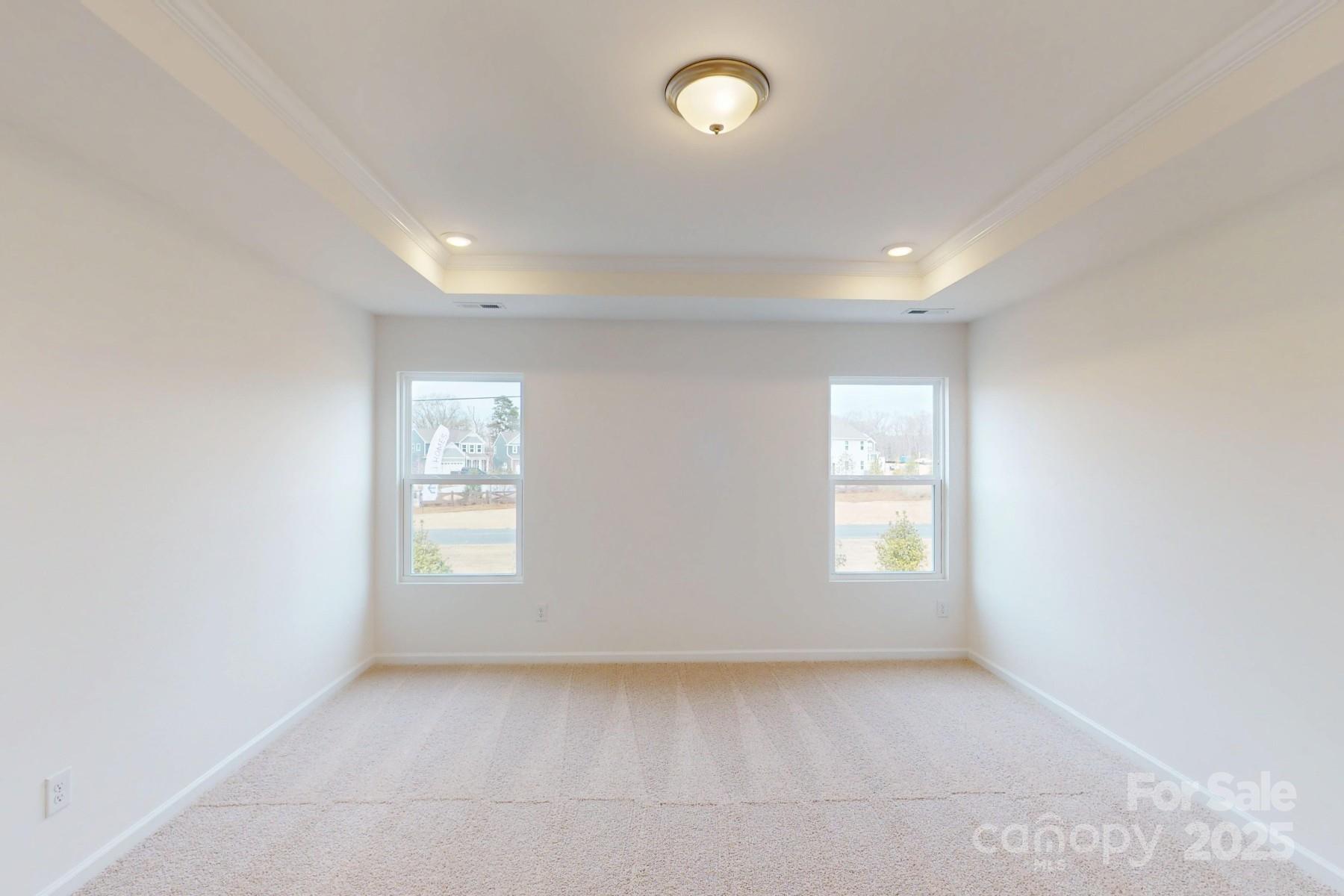 1018 Overbrook Place Wingate, NC 28174 - Photo 16 of 23 an empty room with windows