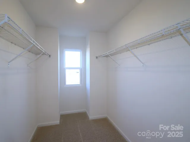 a view of a room with racks on the wall