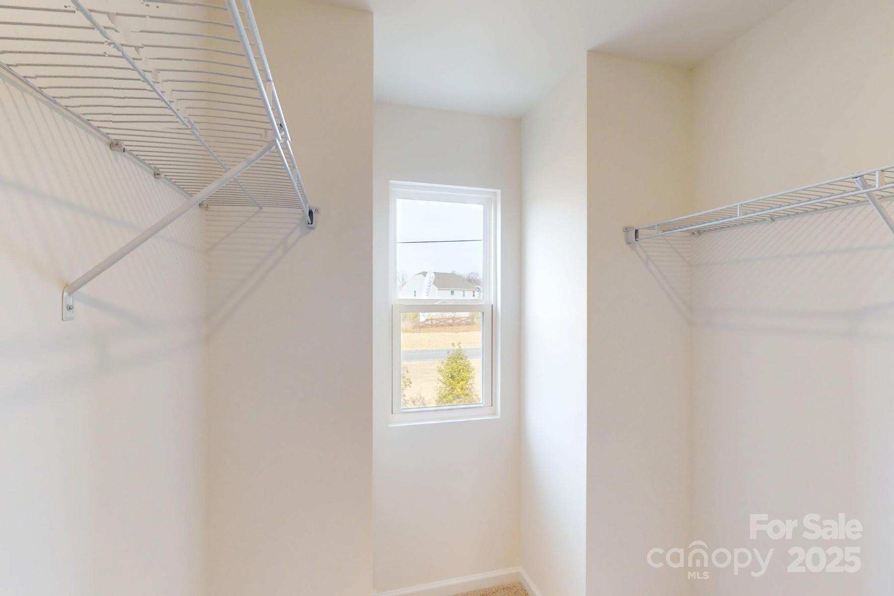 1018 Overbrook Place Wingate, NC 28174 - Photo 22 of 23 a bathroom with a window and a shower