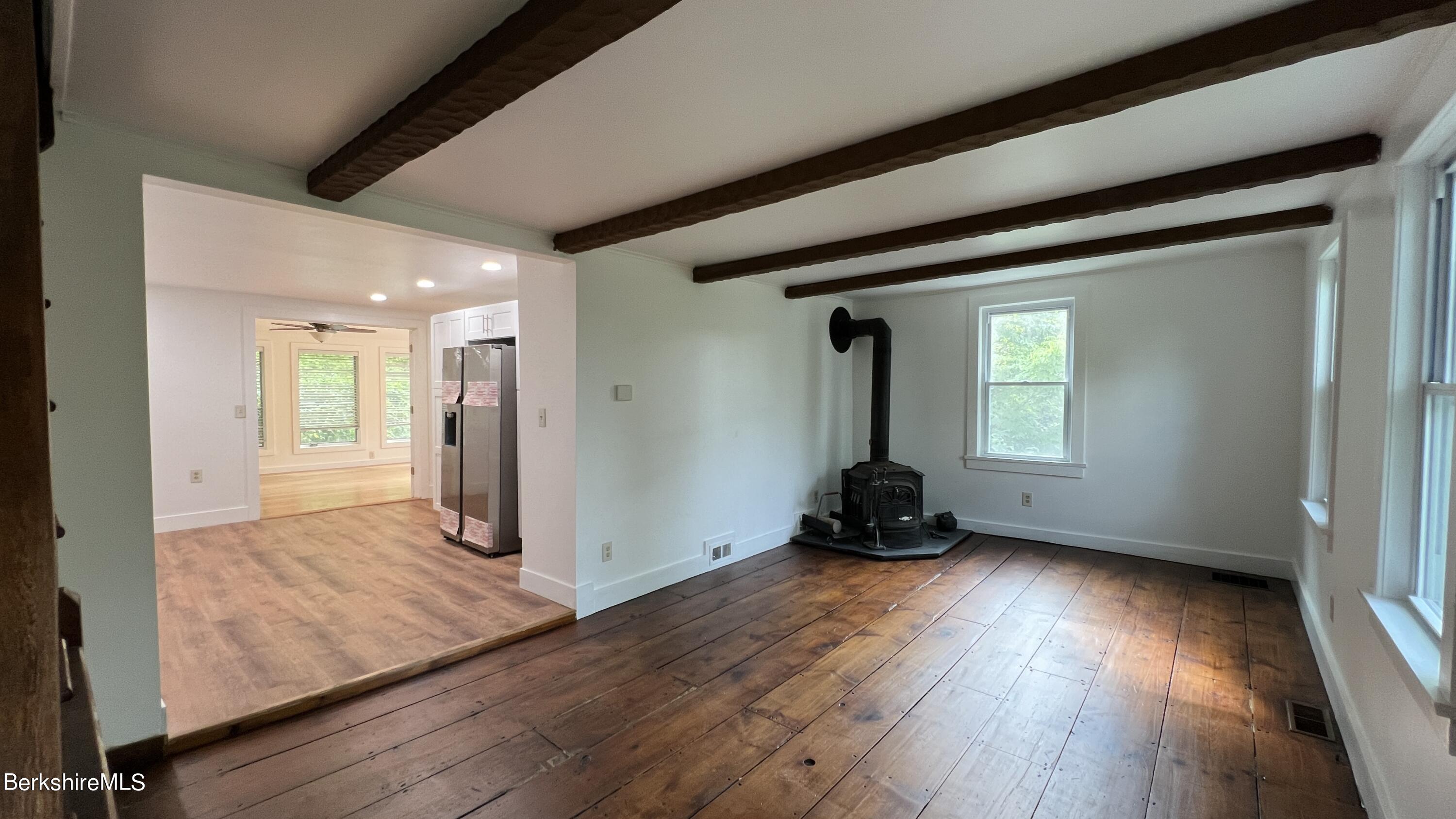 190 Willow Street Lee, MA 01260 - Photo 13 of 48 a view of an empty room and wooden floor