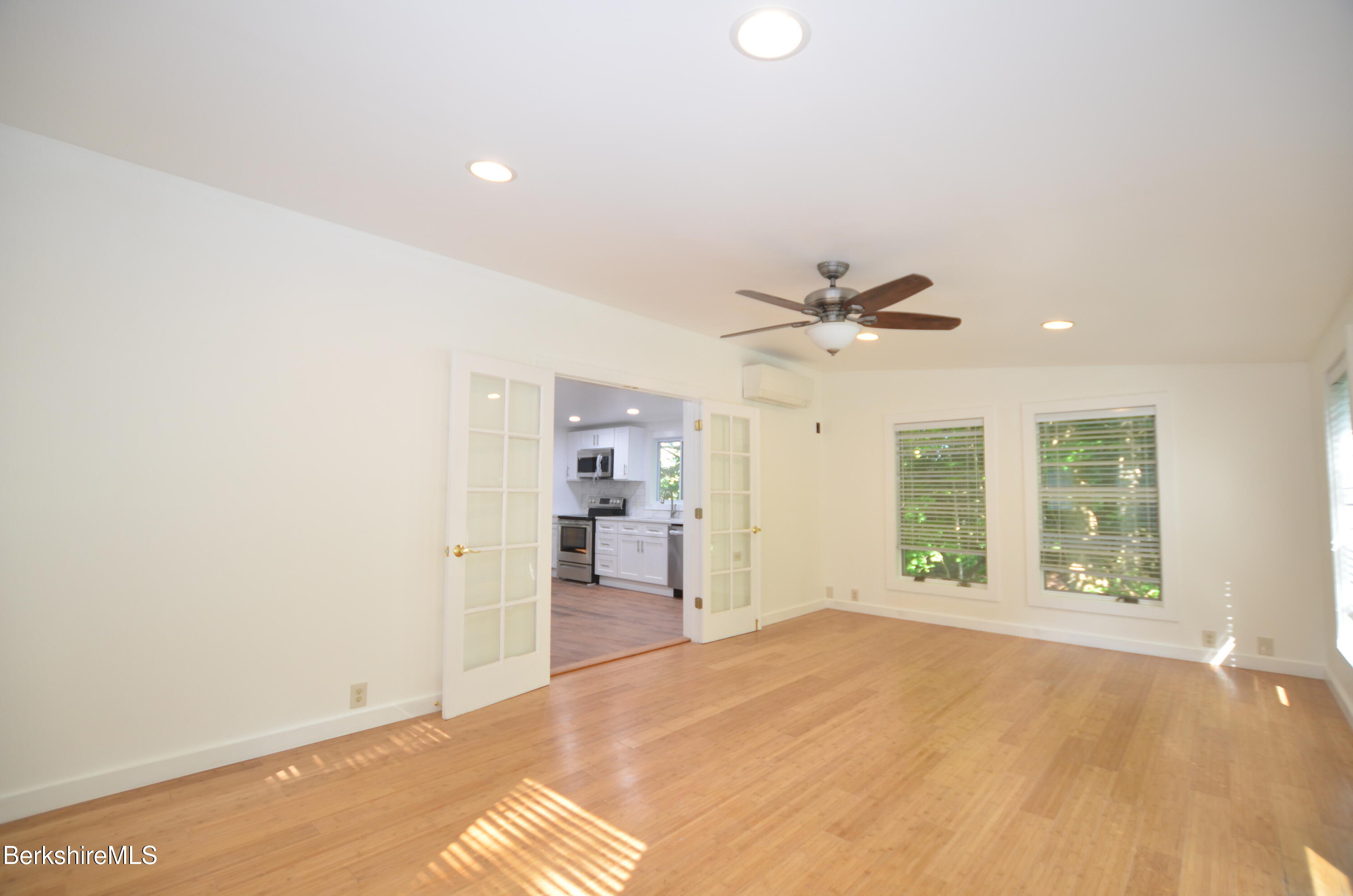 190 Willow Street Lee, MA 01260 - Photo 18 of 48 a view of an empty room with a window