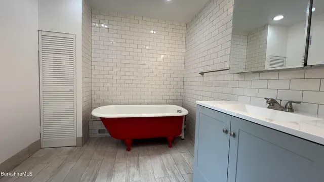 a bed sitting in a room