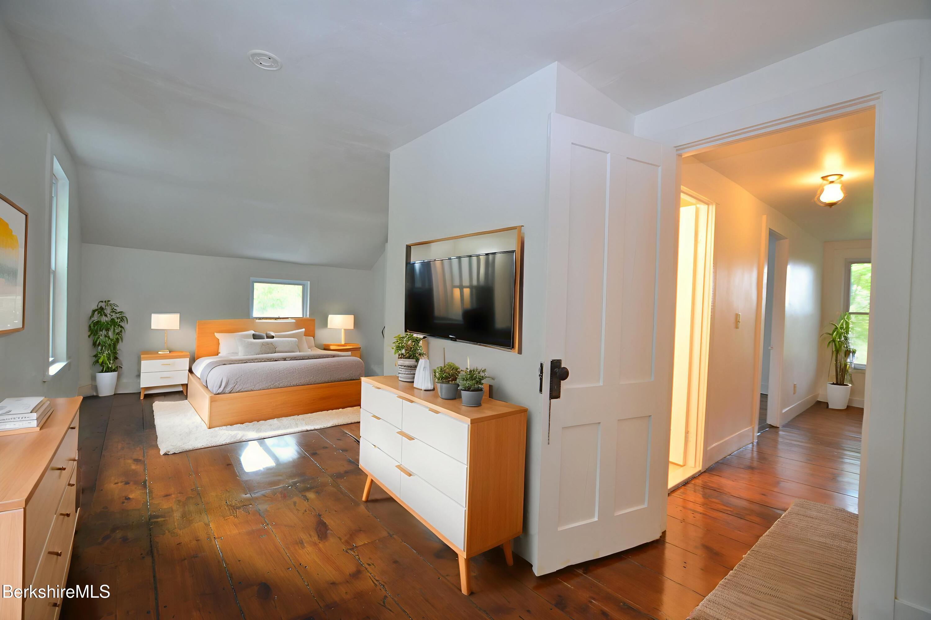 190 Willow Street Lee, MA 01260 - Photo 27 of 48 a room with furniture and flat screen tv