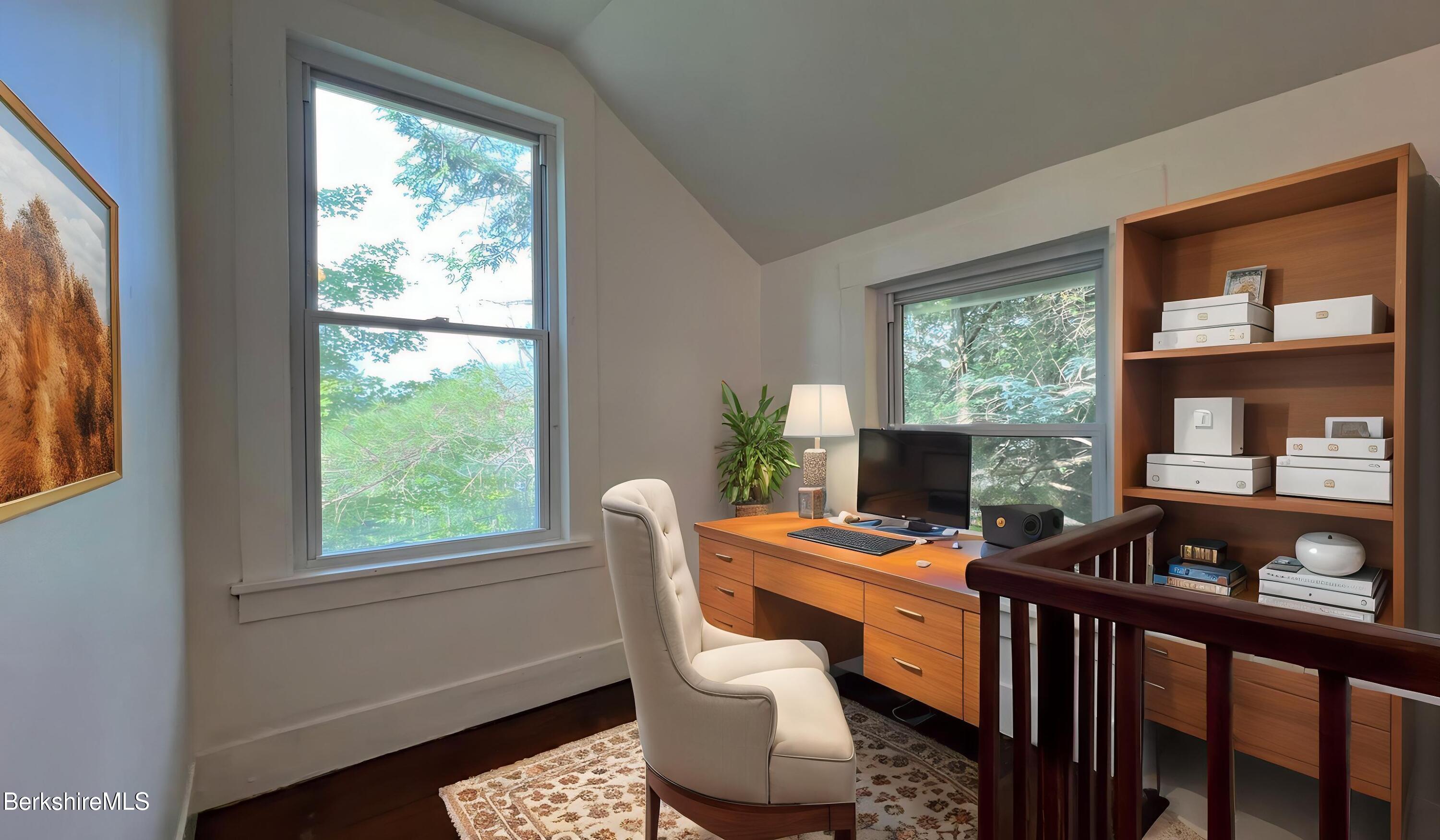 190 Willow Street Lee, MA 01260 - Photo 32 of 48 a room with furniture and a window