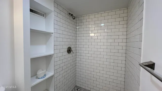 a house with a tree in front of it