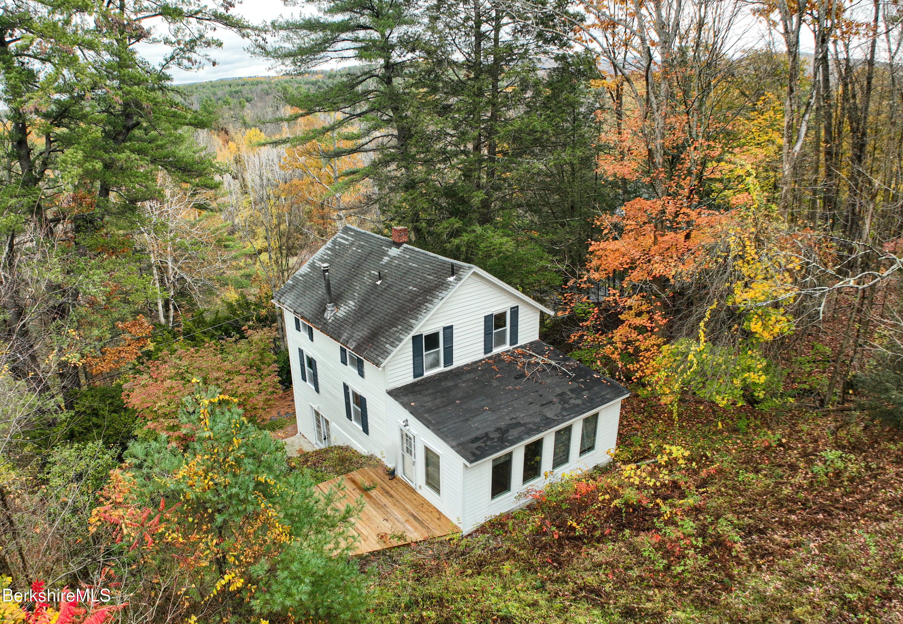 190 Willow Street Lee, MA 01260 - Photo 48 of 48 a house with a tree in front of it