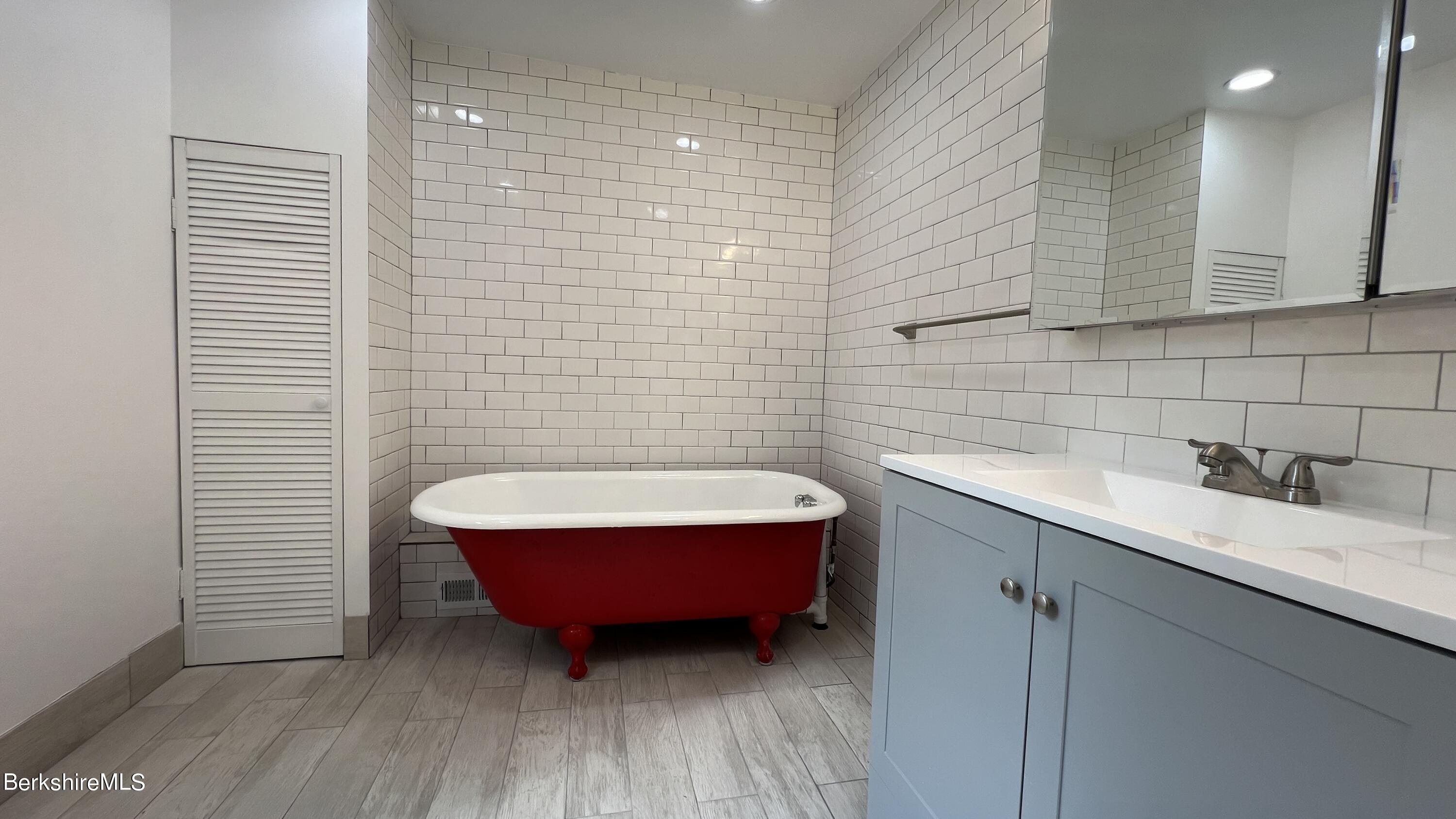 190 Willow Street Lee, MA 01260 - Photo 7 of 41 a bathroom with a sink and a mirror