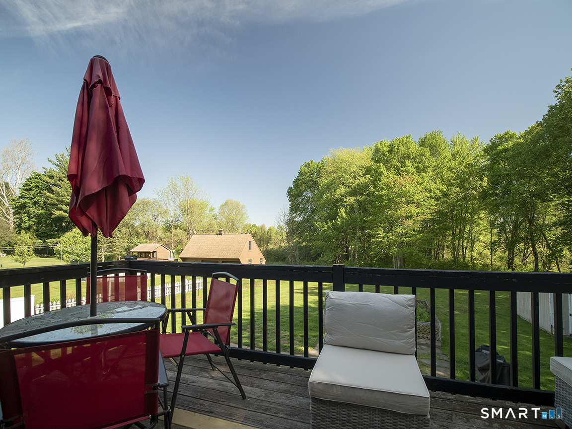 82 Wilcox Road Middletown, CT 06457 - Photo 8 of 27 a view of a two chairs on the roof deck