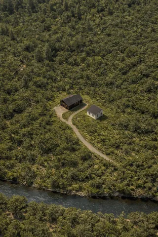 a view of residential houses with lake view