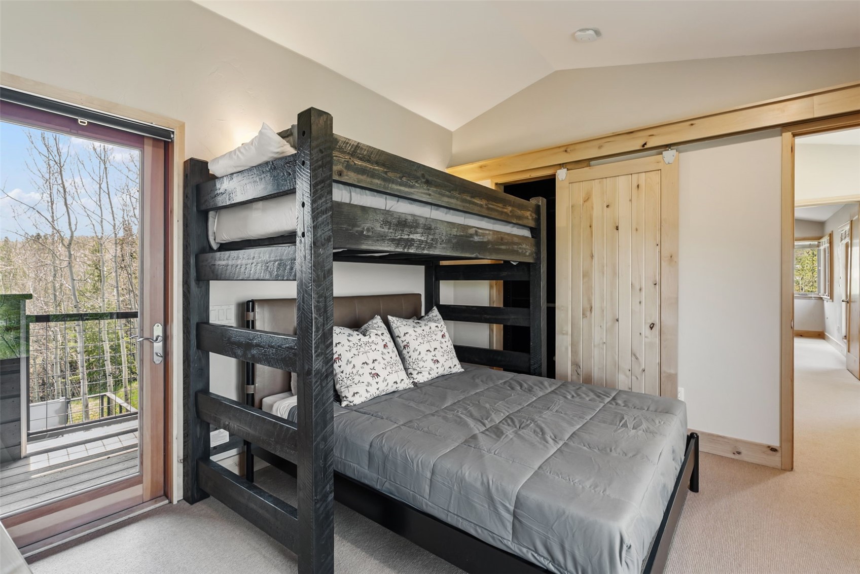 2800 Hunter's Knob Road Silverthorne, CO 80498 - Photo 26 of 37 a bedroom with a bed window and a walk in closet
