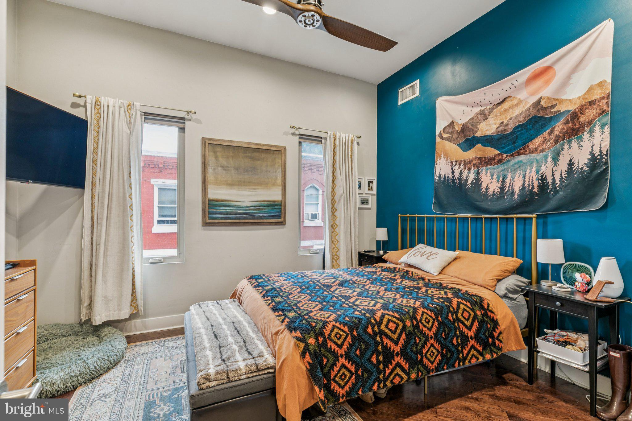 1314 North Dover Street Philadelphia, PA 19121 - Photo 21 of 30 a bedroom with a bed and dresser with the outer view
