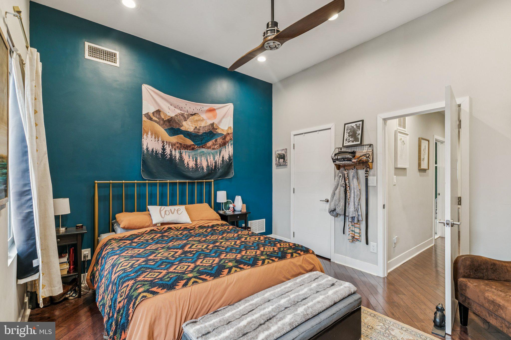 1314 North Dover Street Philadelphia, PA 19121 - Photo 23 of 30 a bedroom with a bed and a painting on the wall