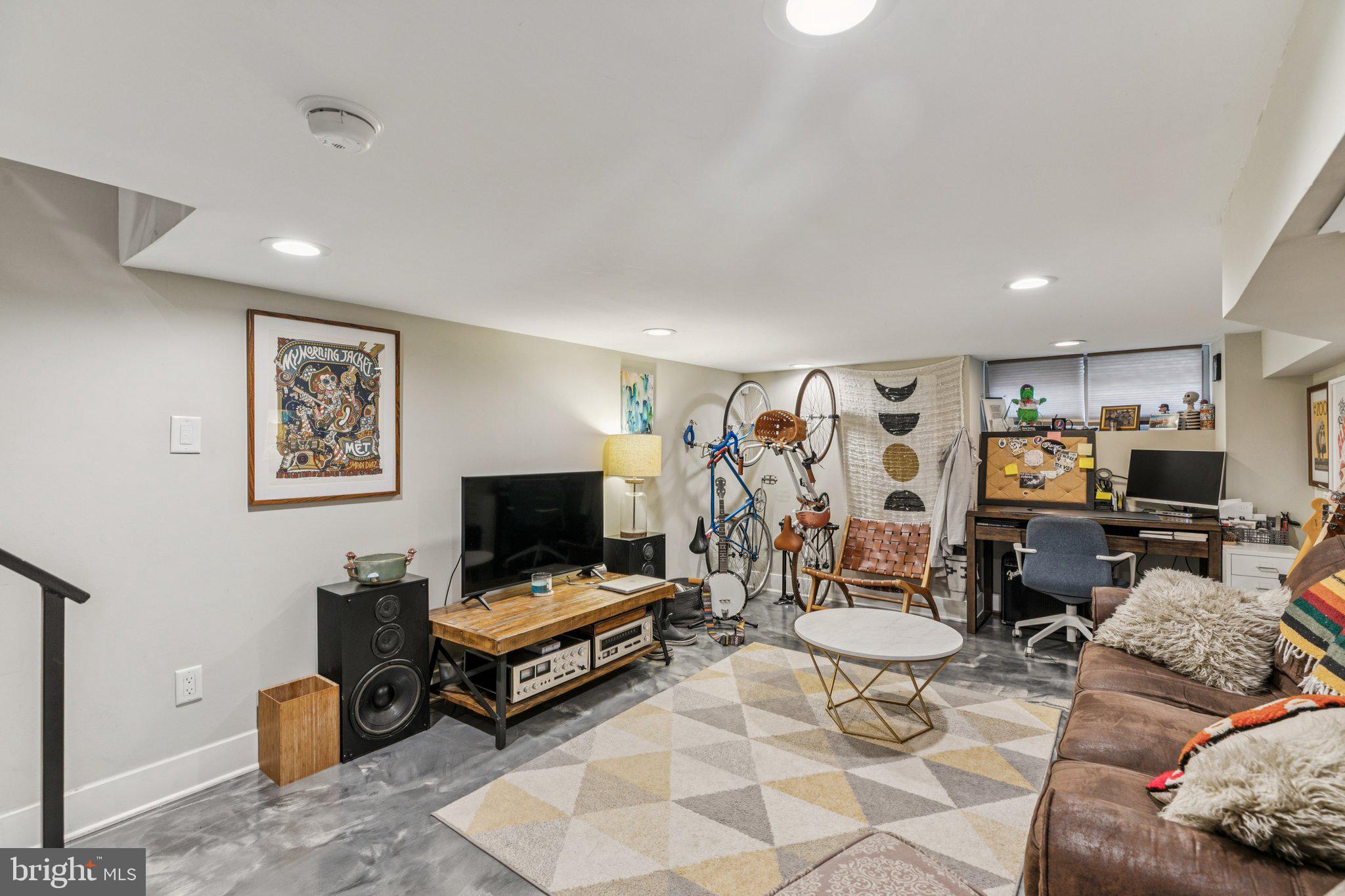 1314 North Dover Street Philadelphia, PA 19121 - Photo 25 of 30 a living room with furniture and a flat screen tv