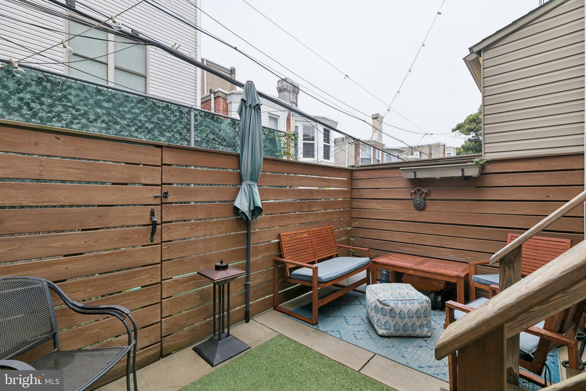 1314 North Dover Street Philadelphia, PA 19121 - Photo 28 of 30 a view of a chairs and table in the balcony