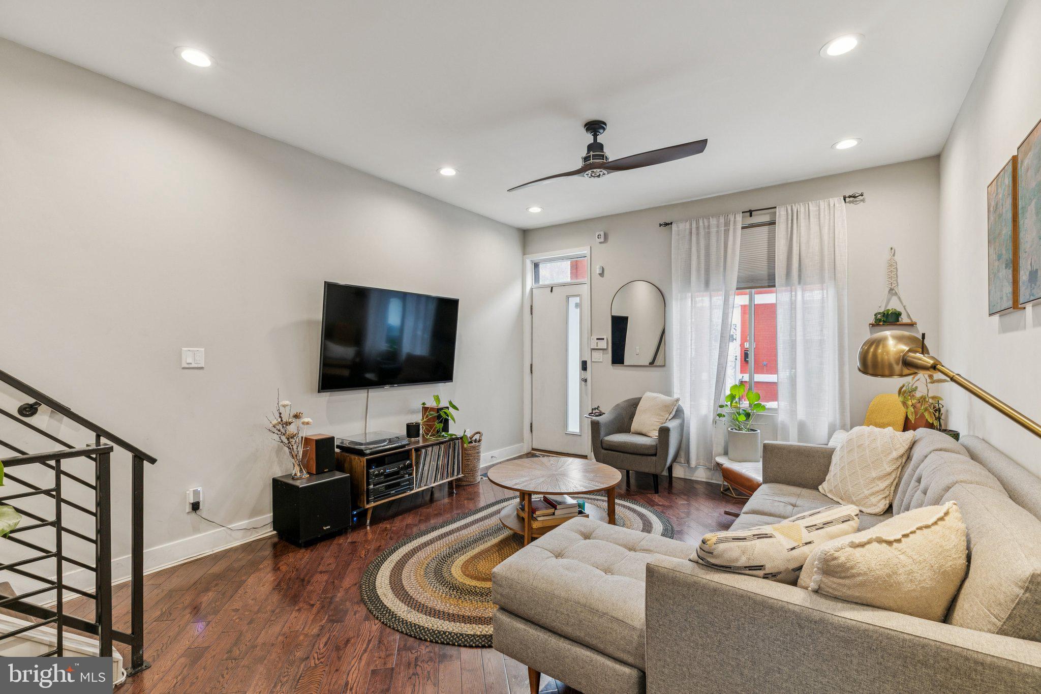 1314 North Dover Street Philadelphia, PA 19121 - Photo 4 of 30 a living room with furniture and a flat screen tv