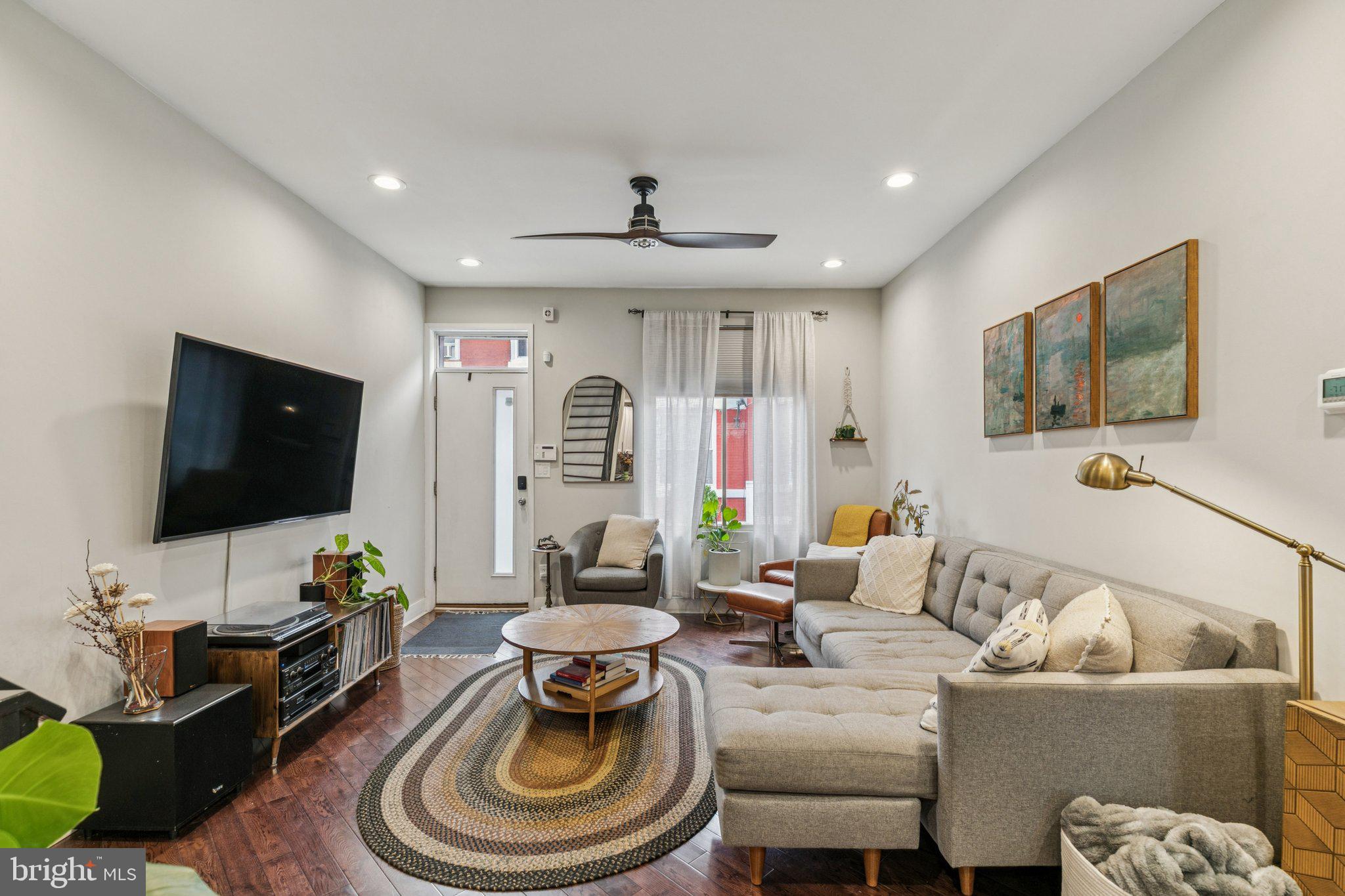 1314 North Dover Street Philadelphia, PA 19121 - Photo 5 of 30 a living room with furniture and a flat screen tv