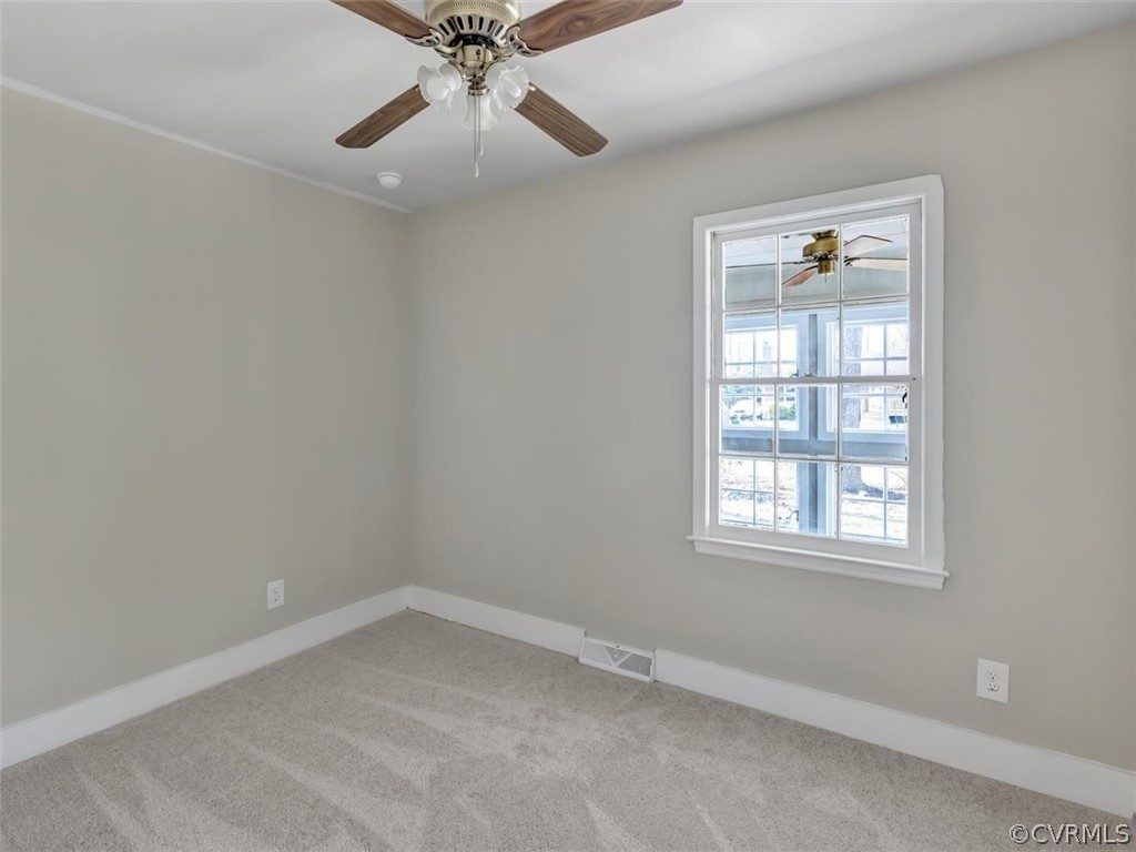 10506 Ridgerun Road Chesterfield, VA 23832 - Photo 16 of 25 an empty room with a window