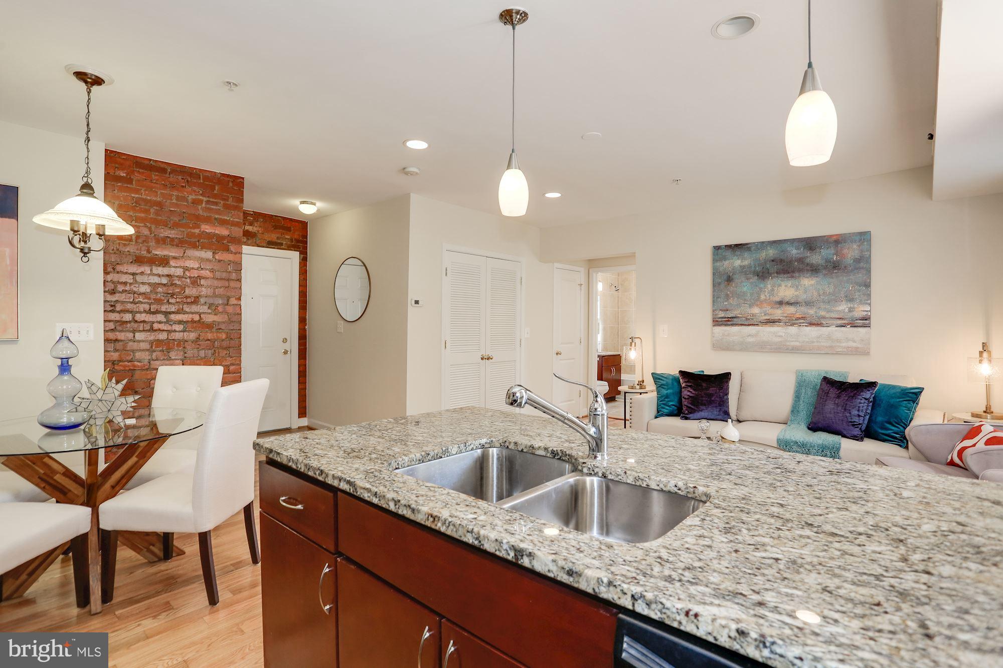 5403 9th Street Northwest, Unit 204 Washington, DC 20011 - Photo 12 of 27 Well laid-out kitchen open to rest of space!