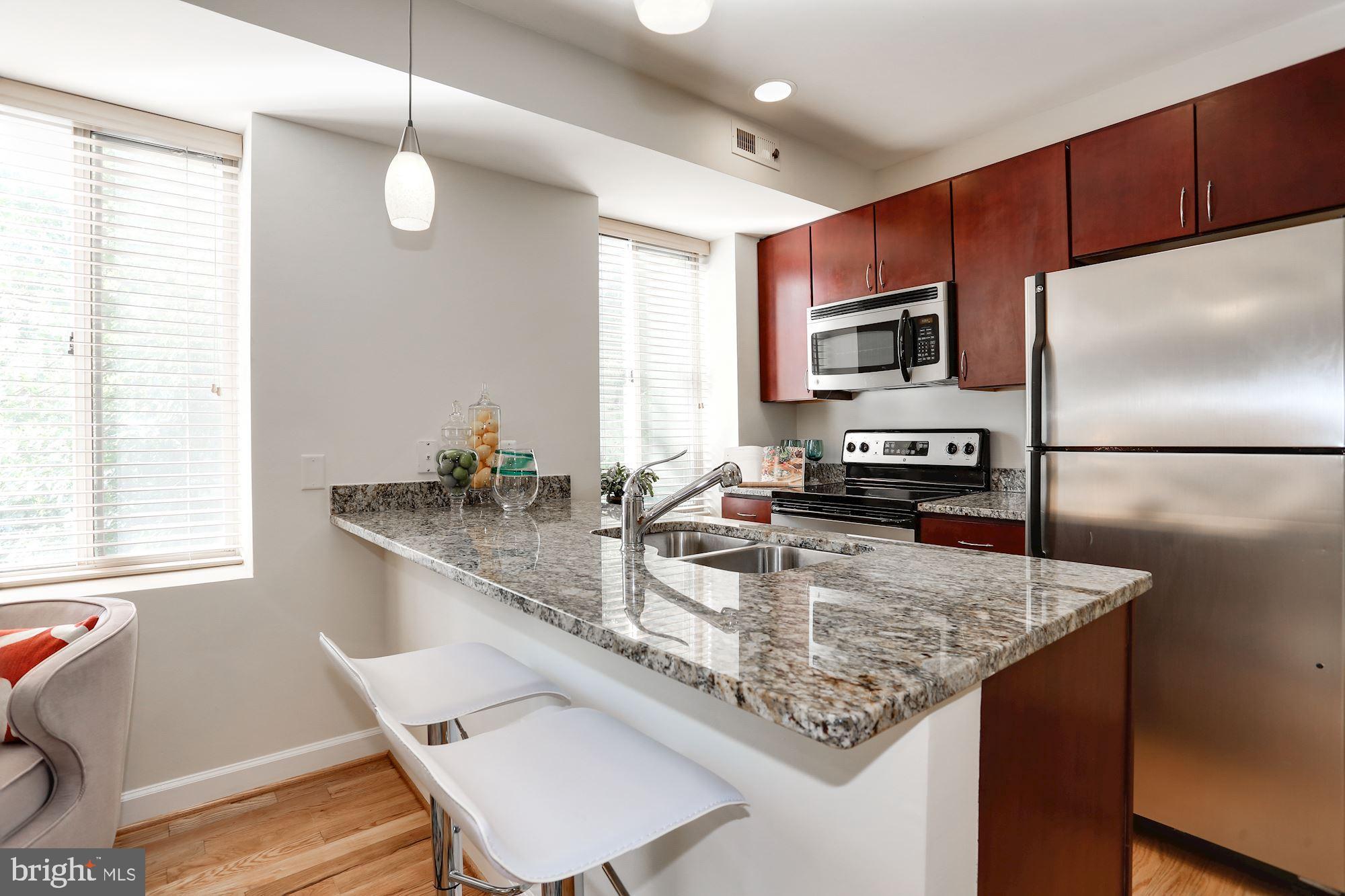 5403 9th Street Northwest, Unit 204 Washington, DC 20011 - Photo 8 of 27 Large Penninsula great for entertaining!