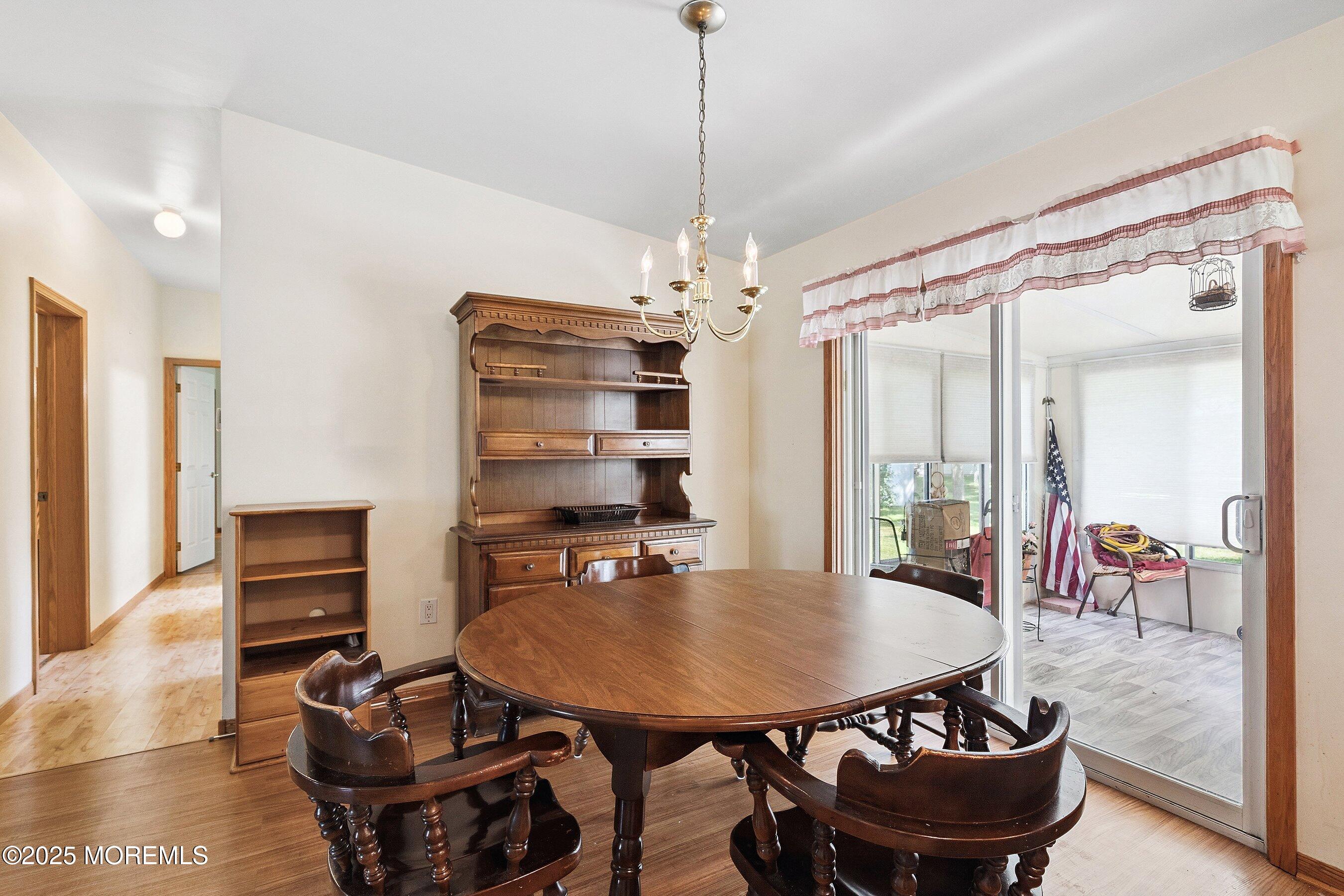 12 Copperfield Drive Cream Ridge, NJ 08514 - Photo 16 of 33 a dining room with furniture and wooden floor