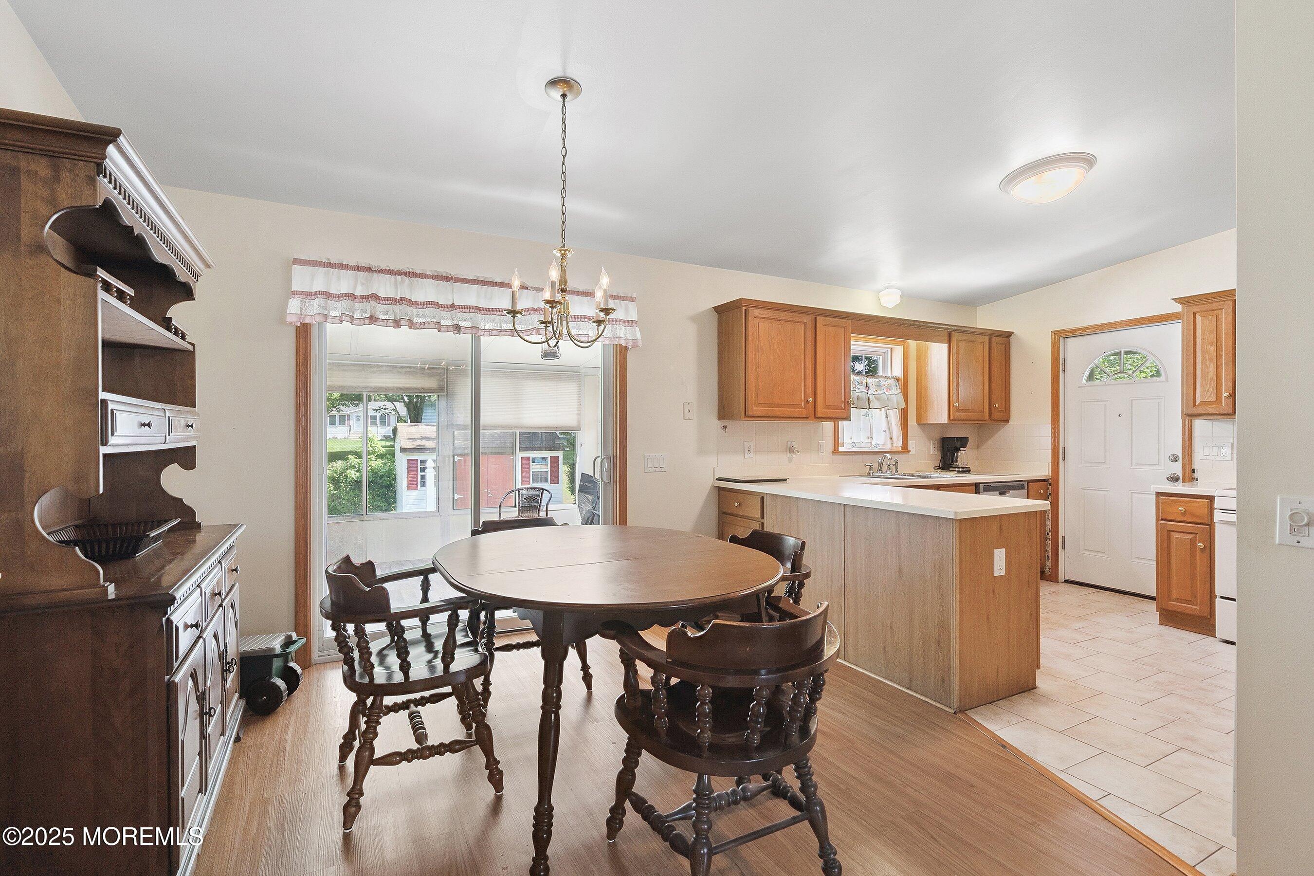 12 Copperfield Drive Cream Ridge, NJ 08514 - Photo 17 of 33 a view of a dining room with furniture window and wooden floor