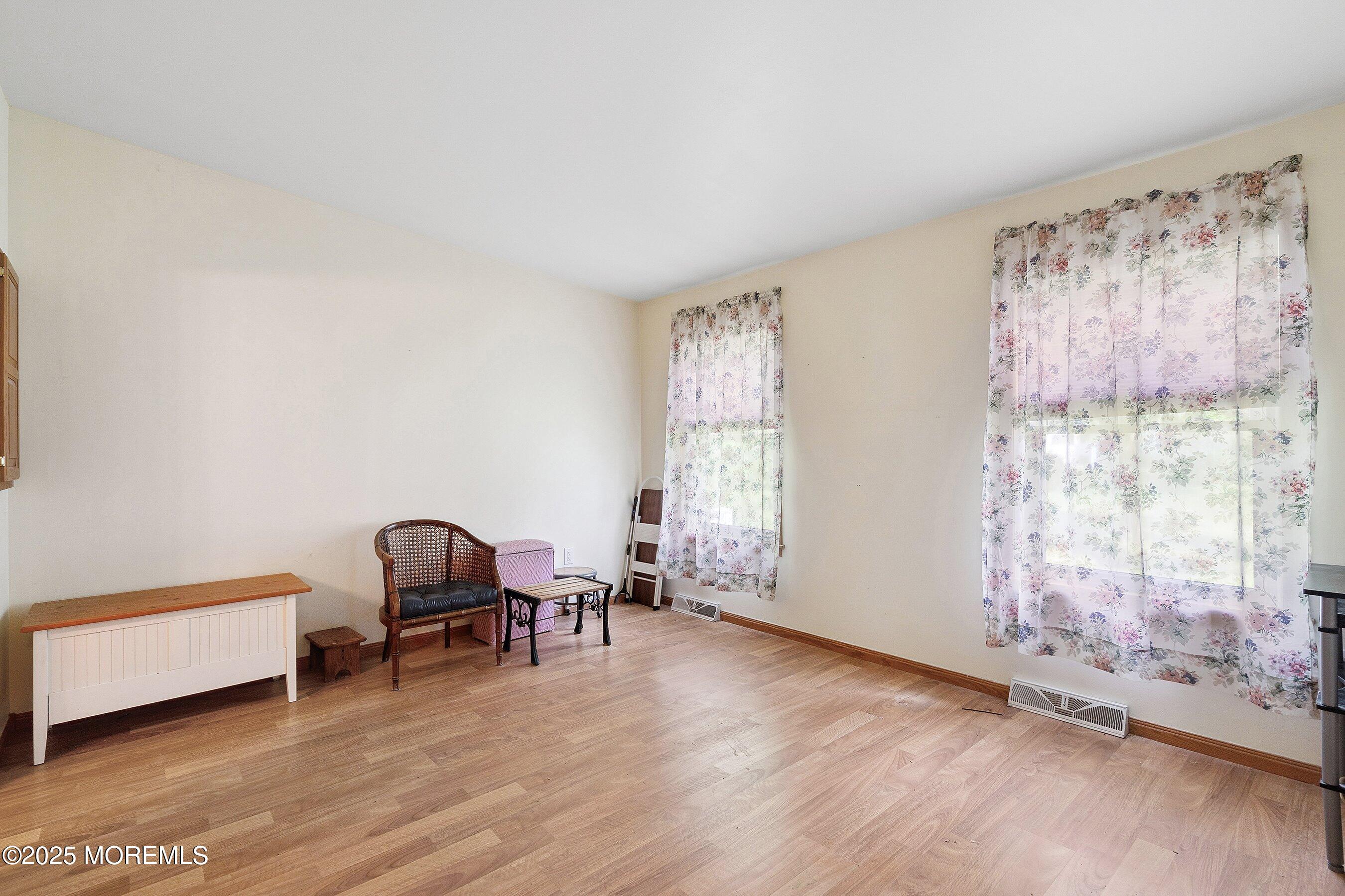 12 Copperfield Drive Cream Ridge, NJ 08514 - Photo 20 of 33 a view of a livingroom with workspace and a window