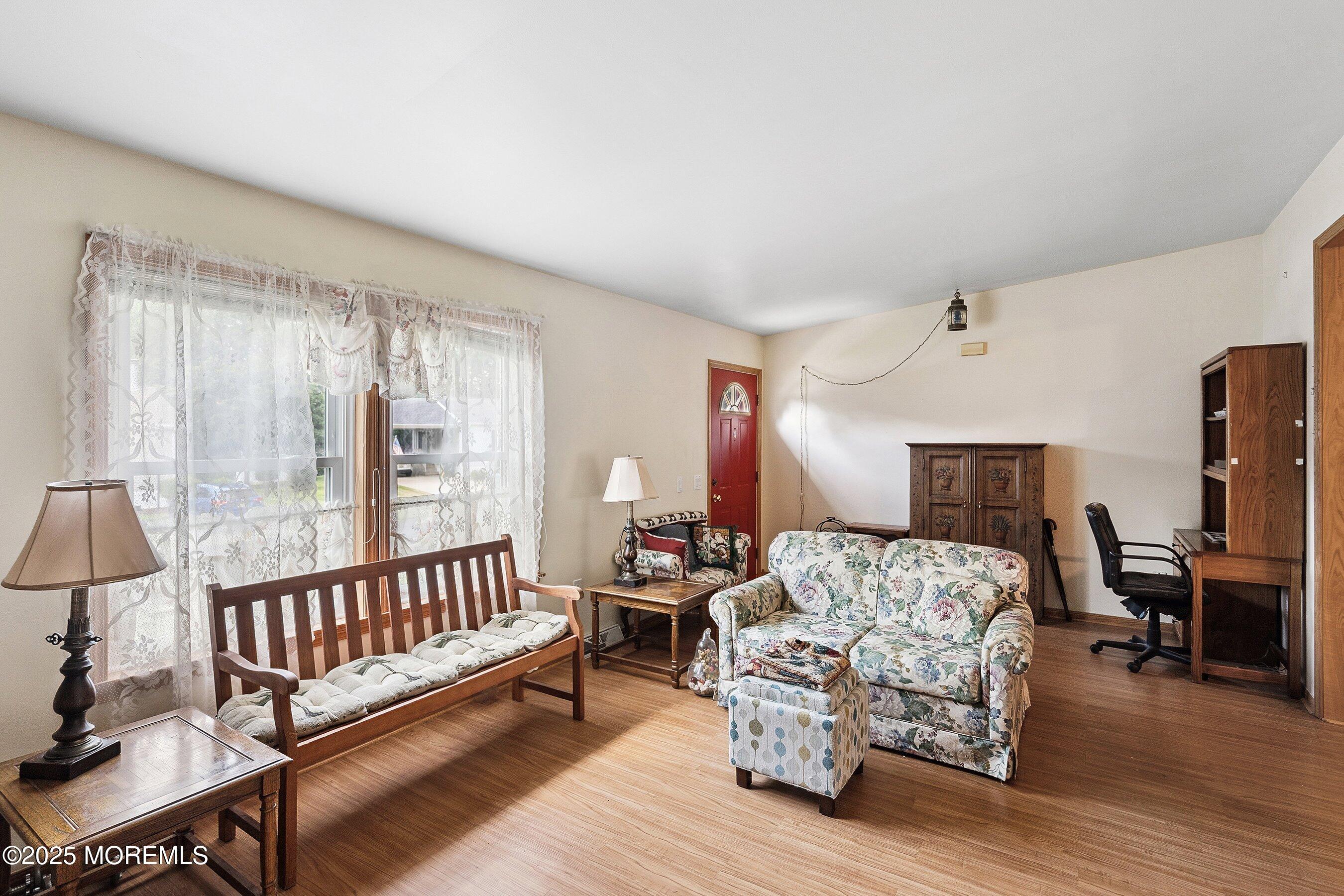 12 Copperfield Drive Cream Ridge, NJ 08514 - Photo 8 of 33 a bedroom with furniture and a window