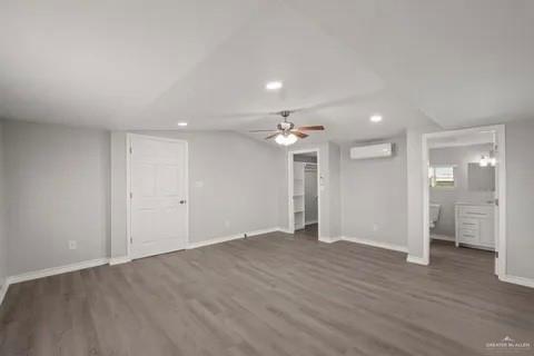 35619 General Brant Road Rio Hondo, TX 78583 - Photo 11 of 21 an empty room with wooden floor and bathroom