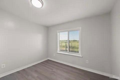 35619 General Brant Road Rio Hondo, TX 78583 - Photo 13 of 21 an empty room with windows