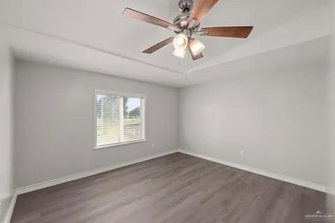 35619 General Brant Road Rio Hondo, TX 78583 - Photo 16 of 21 an empty room with a window and a fan