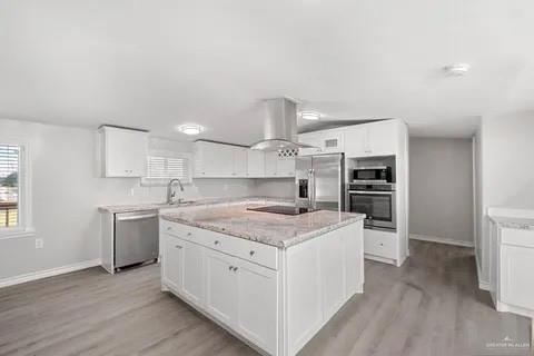 35619 General Brant Road Rio Hondo, TX 78583 - Photo 6 of 21 a kitchen with a stove top oven and cabinets